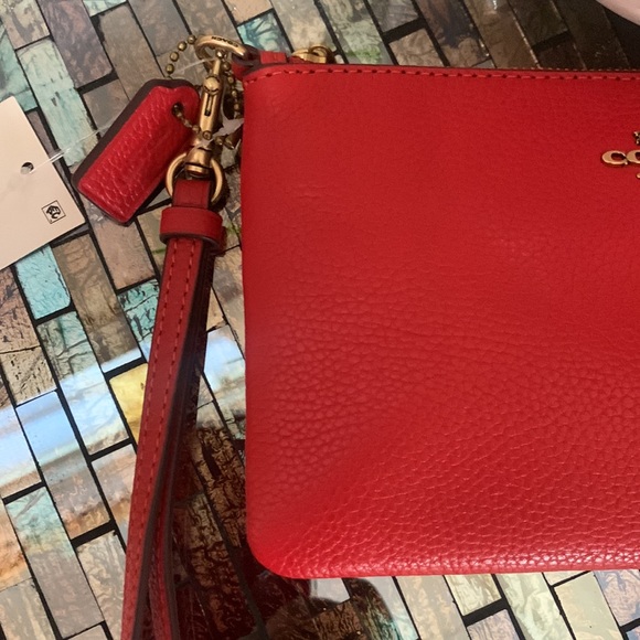 Coach Leather Wristlet
COACH - Picture 17 of 17